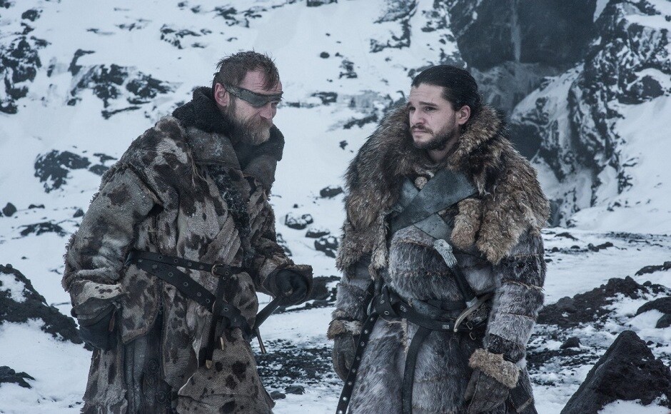 Jon Snow (right) is seen in a candid conversation with Beric Dondarrion (left) while they are on a look-out for a wight. Both of them have been resurrected from their death by followers of the Lord of Light. While Beric has been brought back to life six times by Thoros, Mellisandre revived Jon in the season 6 premiere episode. Image via HBO.
