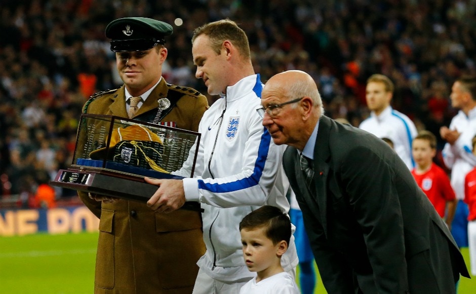 Wayne Rooney poses for a photo after having achieved the milestone of representing England 100 times. He subsequently was awarded by Sir Bobby Charlton for the same. Reuters Wayne Rooney poses for a photo after having achieved the milestone of representing England 100 times. He subsequently was awarded by Sir Bobby Charlton for the same. Reuters