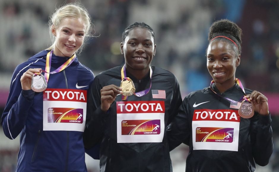 Silver medallist Darya Klishina (L), gold medallist Brittney Reese (centre) and bronze medallist Tianna Bartoletta (R) smile during the medal ceremony for the women's long jump during the IAAF World Championships in London. AP Silver medallist Darya Klishina (L), gold medallist Brittney Reese (centre) and bronze medallist Tianna Bartoletta (R) smile during the medal ceremony for the women's long jump during the IAAF World Championships in London. AP