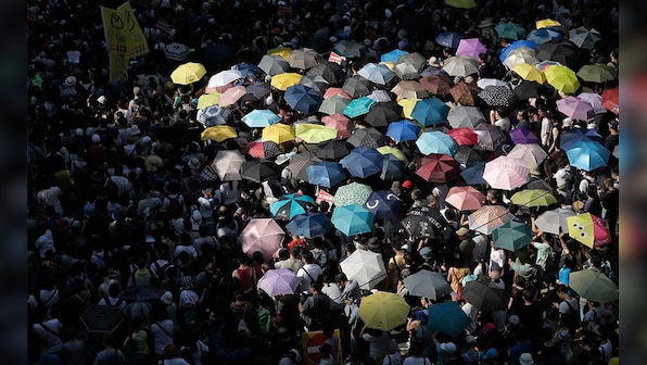 Thousands rally in Hong Kong after pro-democracy 'Umbrella Movement' activists jailed