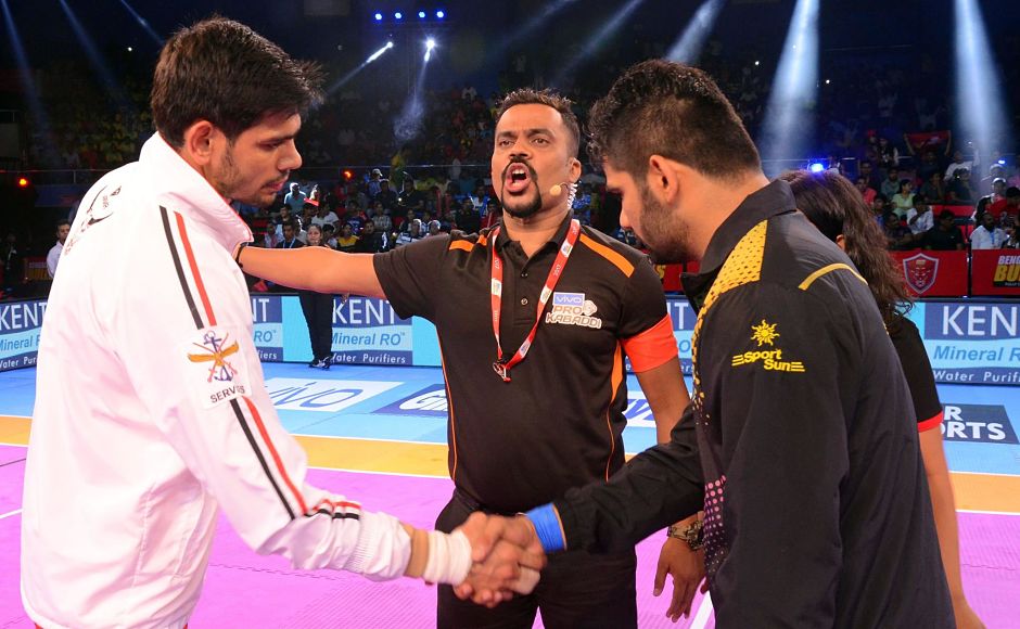 Patna Pirates and Bengaluru Bulls fought in the 2nd match as captains Pardeep Narwal and Rohit Kumar shake hands. Image courtesy:Facebook page of Pro Kabaddi Patna Pirates and Bengaluru Bulls fought in the 2nd match as captains Pardeep Narwal and Rohit Kumar shake hands. Image courtesy:Facebook page of Pro Kabaddi