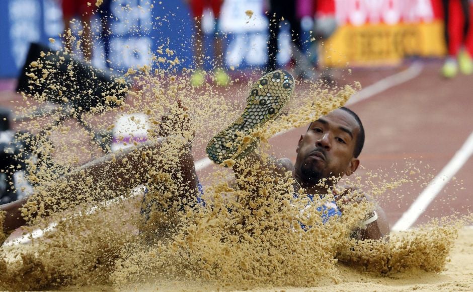 With the automatic qualifying standard set at 17 meters, American Christian Taylor hit 17.15 right away and reached Thursday's triple jump final at the world championships. AP With the automatic qualifying standard set at 17 meters, American Christian Taylor hit 17.15 right away and reached Thursday's triple jump final at the world championships. AP