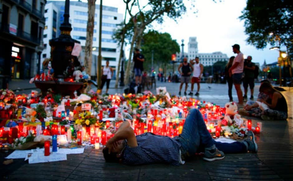 King Felipe of Spain joined people in Barcelona for a minute's silence on Friday where defiant crowds chanted King Felipe of Spain joined people in Barcelona for a minute's silence on Friday where defiant crowds chanted