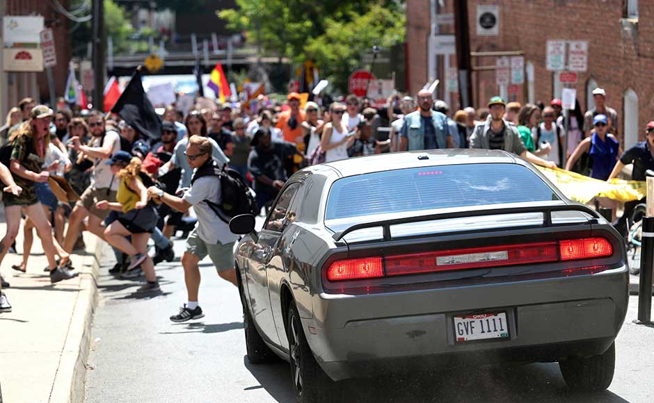 Peaceful protesters were marching downtown, carrying signs that read Peaceful protesters were marching downtown, carrying signs that read