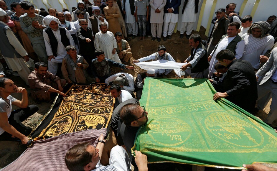 Terrified worshippers endured for four hours of gunfire and explosions before four attackers were killed. The Islamic State in its statement said that it had deployed two attackers to the mosque. However, they did not give any explanation for the contradictory number of attackers. Reuters Terrified worshippers endured for four hours of gunfire and explosions before four attackers were killed. The Islamic State in its statement said that it had deployed two attackers to the mosque. However, they did not give any explanation for the contradictory number of attackers. Reuters