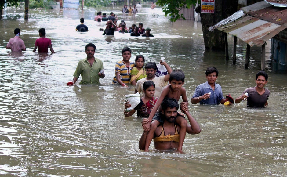 The Assam state administration has set up 315 relief camps in the state where 1.68 lakh people are taking shelter. Heavy rains snapped communications between upper and lower Assam after flood waters started flowing over National Highway 37. PTI The Assam state administration has set up 315 relief camps in the state where 1.68 lakh people are taking shelter. Heavy rains snapped communications between upper and lower Assam after flood waters started flowing over National Highway 37. PTI
