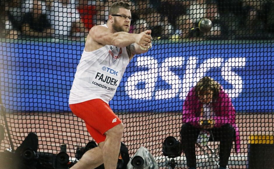 Poland's Pawel Fajdek won his third straight hammer throw world title with a throw of 79.81 metres. AP Poland's Pawel Fajdek won his third straight hammer throw world title with a throw of 79.81 metres. AP