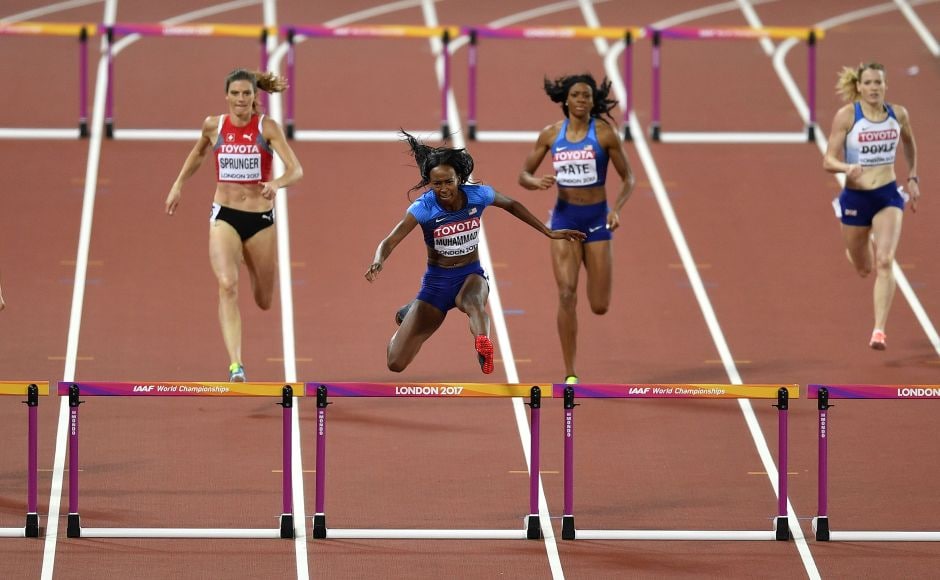 Dalilah Muhammad (centre) jumps the final hurdle on her way to a silver medal in the women's 400 metre hurdles final. AP Dalilah Muhammad (centre) jumps the final hurdle on her way to a silver medal in the women's 400 metre hurdles final. AP