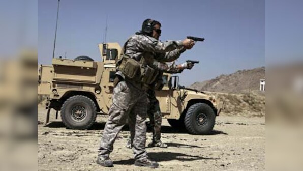 Gunman in Afghan army uniform kills two US soldiers and injures six in Nangarhar; shot dead by forces