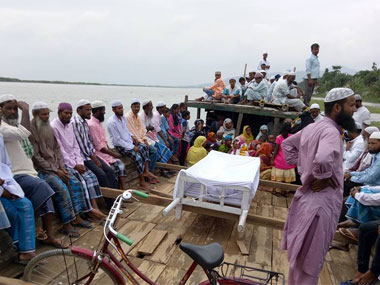 Marooned by floods, Assam's dead get watery grave as land disappear Marooned by floods, Assam's dead get watery grave as land disappear