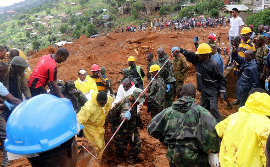 The mudslide which occurred after three days of torrential rain overran several houses killing residents, many of whom were trapped inside. AP The mudslide which occurred after three days of torrential rain overran several houses killing residents, many of whom were trapped inside. AP