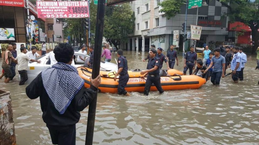 With at least a 100 houses flooded and people stranded in other parts, rubber boats were called in to ferry many to safety. Image courtesy: Facebook/ Priya Chetty-Rajagopal