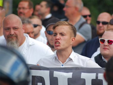 participants at a far-right protest commemorating the 30th anniversary of the death of leading Nazi figure Rudolf Hess rally in Berlin. AP