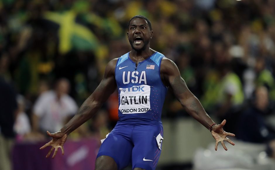 United States' Justin Gatlin celebrates after crossing the line to win the gold medal in the Men's 100m final. AP