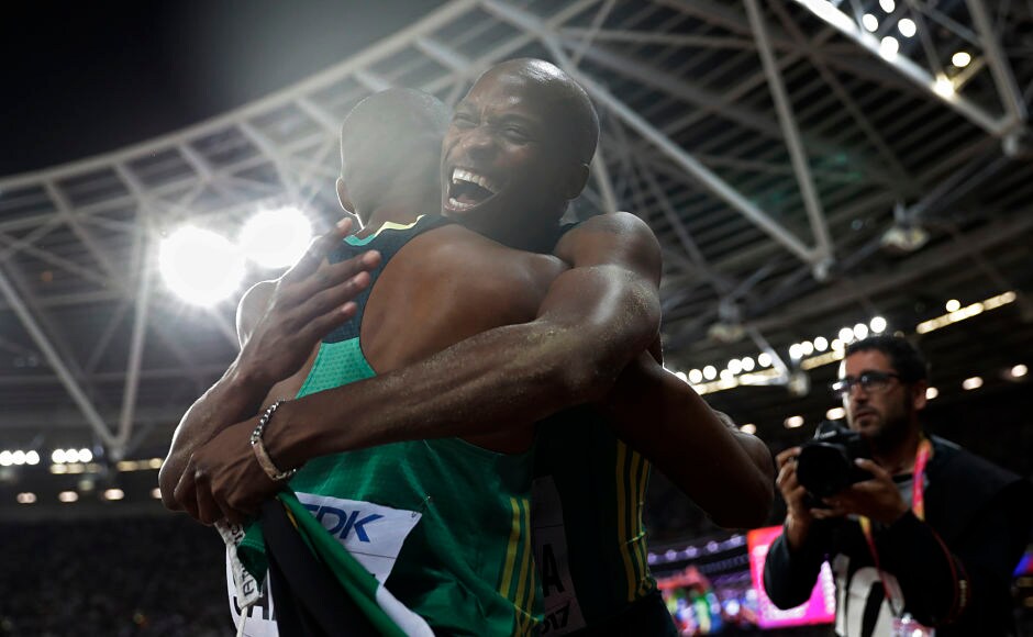 South Africa's gold medal winner Luvo Manyonga is congratulated by his teammate South Africa's Ruswahl Samaai after the men's long jump final. AP