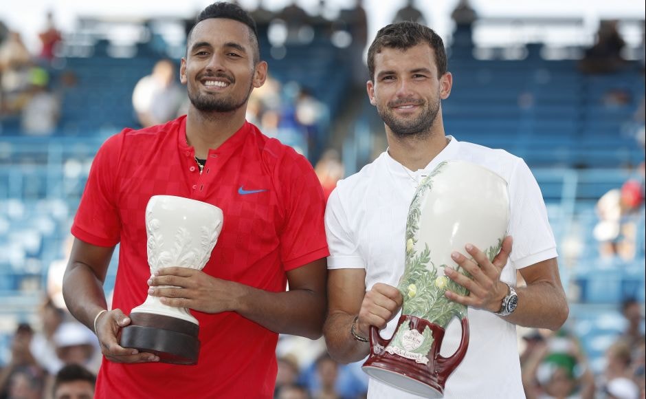 Grigor Dimitrov (R) holds the Cincinnati Masters trophy alongside runner-up Nick Kyrgios in the men's singles final. AP Grigor Dimitrov (R) holds the Cincinnati Masters trophy alongside runner-up Nick Kyrgios in the men's singles final. AP