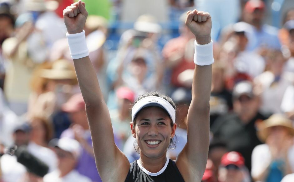 Garbine Muguruza cradled her smiling face in both hands and closed her eyes, taking it all in. Then she put her hands over her heart and reached toward the applauding crowd. AP Garbine Muguruza cradled her smiling face in both hands and closed her eyes, taking it all in. Then she put her hands over her heart and reached toward the applauding crowd. AP