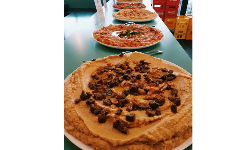 Different varieties of Syrian dips. Image courtesy: Jasmin Catering Facebook page