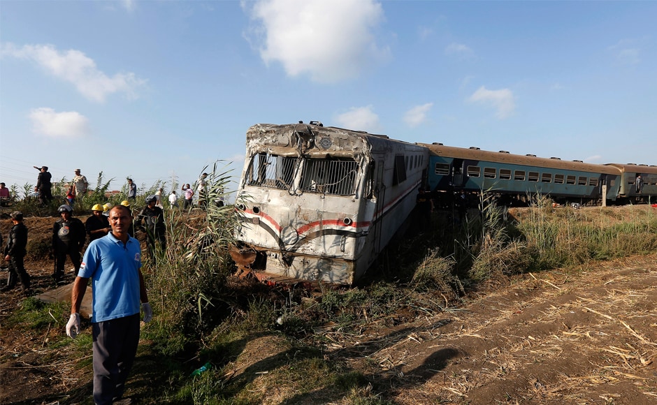 Transport ministry officials, quoted on state television, said the crash was probably caused by a malfunction in one train that brought it to a halt on the rails. The other train then crashed into it. AP Transport ministry officials, quoted on state television, said the crash was probably caused by a malfunction in one train that brought it to a halt on the rails. The other train then crashed into it. AP