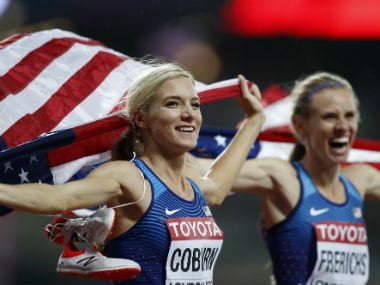USA's Emma Coburn celebrates with compatriot and silver medal winner Courtney Frerichs, right, after winning the gold medal in the women's 3000m steeplechase final. AP