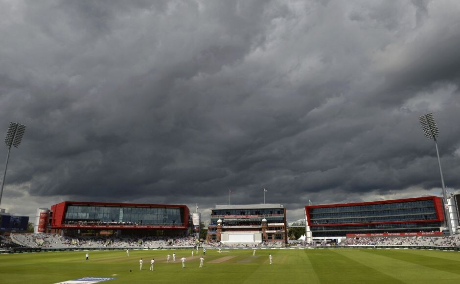 Clouds lour over the Old Trafford cricket ground as James Anderson bowls from the James Anderson end. He had Heino Kuhn edging to first slip as England picked up their 2nd wicket. AP Clouds lour over the Old Trafford cricket ground as James Anderson bowls from the James Anderson end. He had Heino Kuhn edging to first slip as England picked up their 2nd wicket. AP