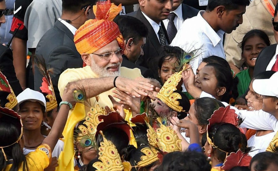 After concluding his speech, Modi interacted with children who had gathered at the Red Fort. PTI After concluding his speech, Modi interacted with children who had gathered at the Red Fort. PTI