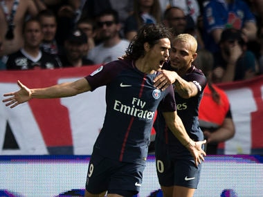 PSG's Edison Cavani, left, and PSG's Layvin Kurzawa celebrate after scoring against Amiens during the French League One soccer match between Paris Saint Germain and Amiens at the Parc des Princes stadium in Paris, France, Saturday, Aug. 5, 2017. (AP Photo/Kamil Zihnioglu)