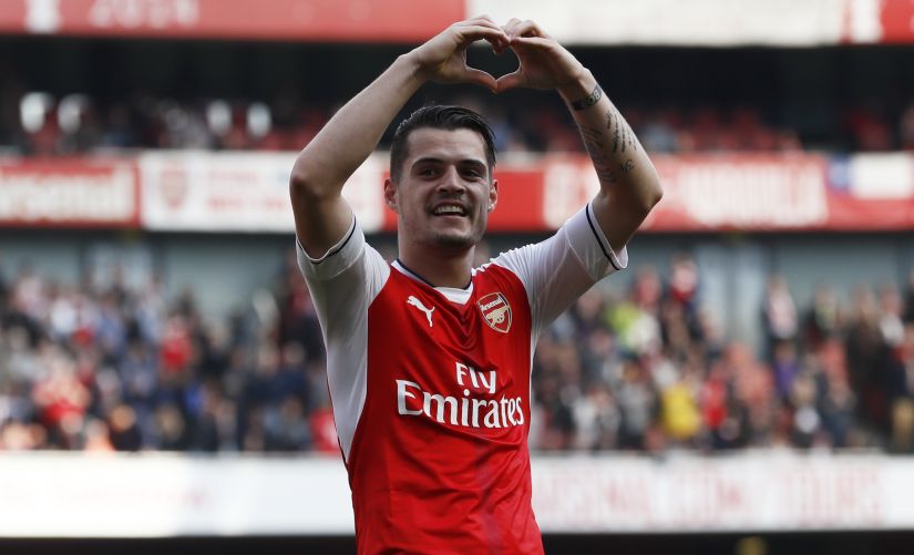Granit Xhaka brings a lot to the table and this is his chance to step into Santi Cazorla's shoes and help Arsenal break Premier League Trophy drought. Reuters