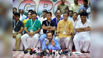 Gujarat HC issues notice to Ahmed Patel, EC on plea challenging invalidation of Congress MLAs votes