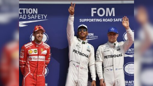 Belgian Grand Prix: Lewis Hamilton wins pole, equals Michael Schumacher's record; Sebastian Vettel second