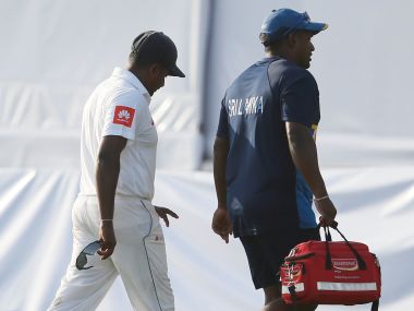 Cricket - Sri Lanka v India - First Test Match - Galle, Sri Lanka - July 28, 2017 - Sri Lanka's captain Rangana Herath leaves the ground after being injured. REUTERS/Dinuka Liyanawatte - RTX3DA7N