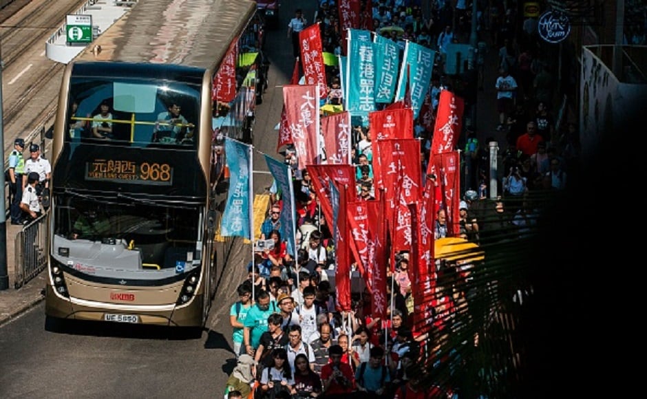 Thousands of people in Hong Kong took to the streets to protest jailing of three pro-democracy leaders for involvement in 2014 umbrella movement. Getty Images Thousands of people in Hong Kong took to the streets to protest jailing of three pro-democracy leaders for involvement in 2014 umbrella movement. Getty Images