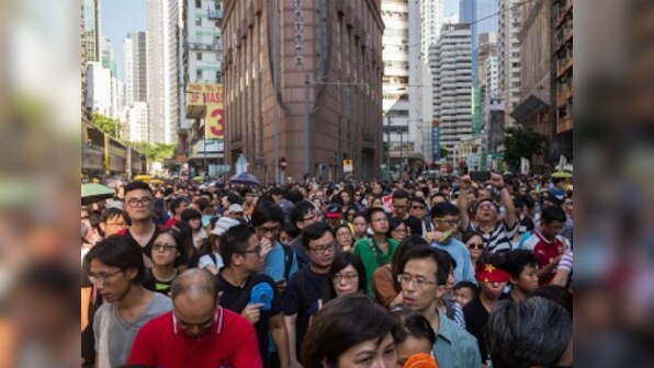 Thousands protest in Hong Kong against jail sentence of three pro-democracy activists
