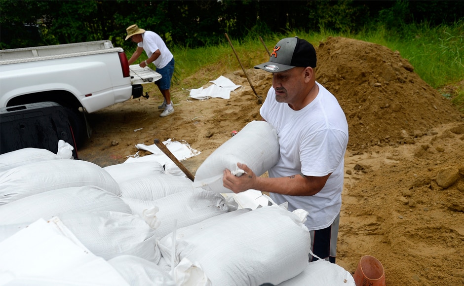 In Corpus Christi, many residents appeared bent on sitting the storm out, packing sandbags to protect their homes - until the supply of sandbags ran out. As the storm struck city officials urged residents to boil tap water as a precautionary measure. AP In Corpus Christi, many residents appeared bent on sitting the storm out, packing sandbags to protect their homes - until the supply of sandbags ran out. As the storm struck city officials urged residents to boil tap water as a precautionary measure. AP