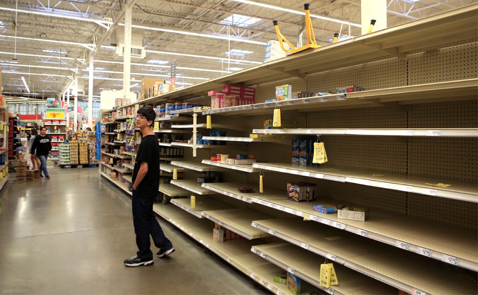 Supermarket aisles were stripped bare, as people boarded up supplies in their houses. Hurricane Harvey could dump up to 40 inches (more than one meter) of rain on the area over the next few days and cause billions of dollars in damage. AP Supermarket aisles were stripped bare, as people boarded up supplies in their houses. Hurricane Harvey could dump up to 40 inches (more than one meter) of rain on the area over the next few days and cause billions of dollars in damage. AP