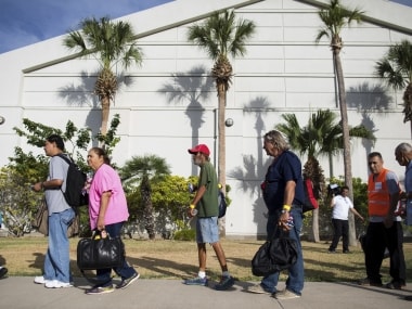 People being evacuated before Hurricane Harvey makes landfall. AP