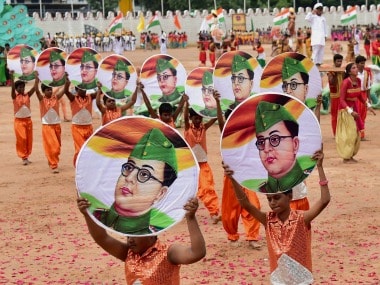 Children carry posters of freedom fighter Subhash Chandra Bose during the celebrations on the occasion of 71st Independence day at Parade Ground in Bengaluru on Tuesday. PTI