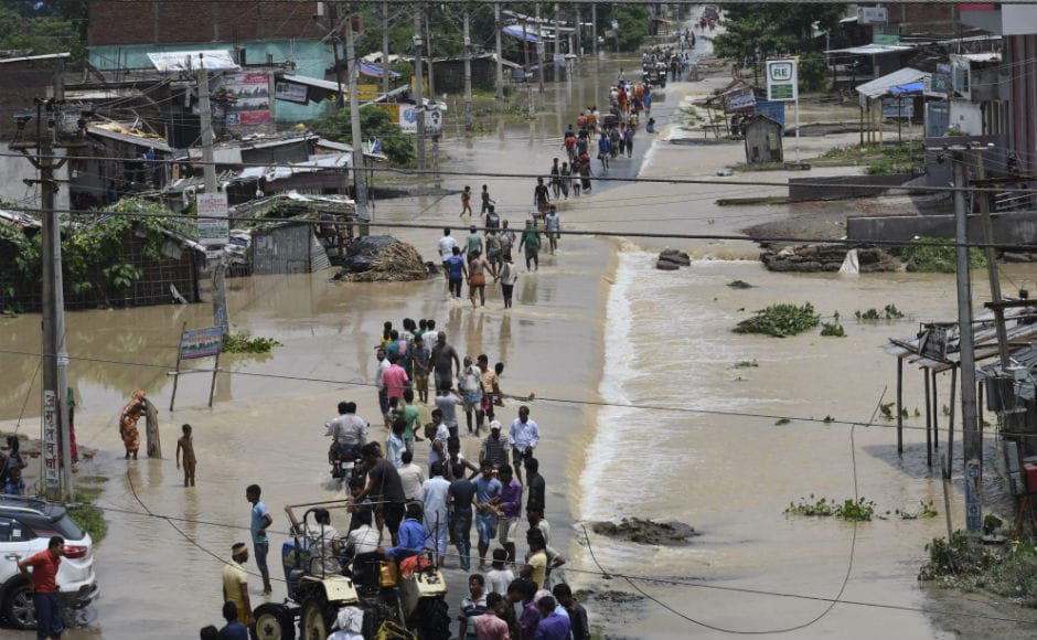 In Bihar, the death toll in the state has now climbed to 56, affecting 69.81 lakh people in 13 districts. So far, 1.61 lakh people have been evacuated and taken to safer places, out of which 85,949 have been put up in 343 relief camps in different places. AP In Bihar, the death toll in the state has now climbed to 56, affecting 69.81 lakh people in 13 districts. So far, 1.61 lakh people have been evacuated and taken to safer places, out of which 85,949 have been put up in 343 relief camps in different places. AP