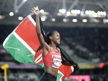 Kenya's Faith Chepngetich Kipyegon celebrates after winning the gold medal in the women's 1500-meter final during the World Athletics Championships in London Monday, Aug. 7, 2017. (AP Photo/Matt Dunham)