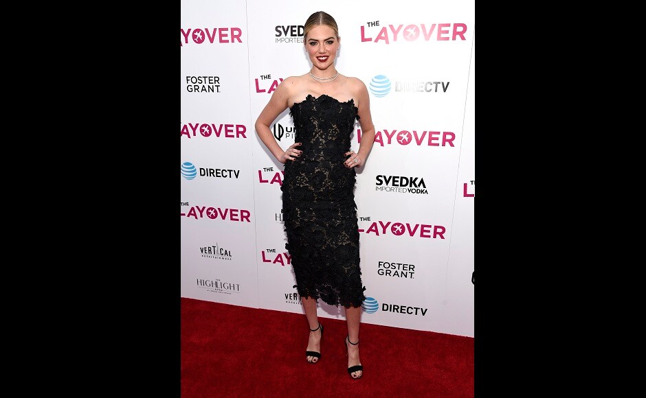 Kate Upton plays the role of a business woman in the film, The Layover who goes for a road trip with her best friend and ends up competing with her for a guy. Photo by Chris Pizzello/Invision/AP Kate Upton plays the role of a business woman in the film, The Layover who goes for a road trip with her best friend and ends up competing with her for a guy. Photo by Chris Pizzello/Invision/AP