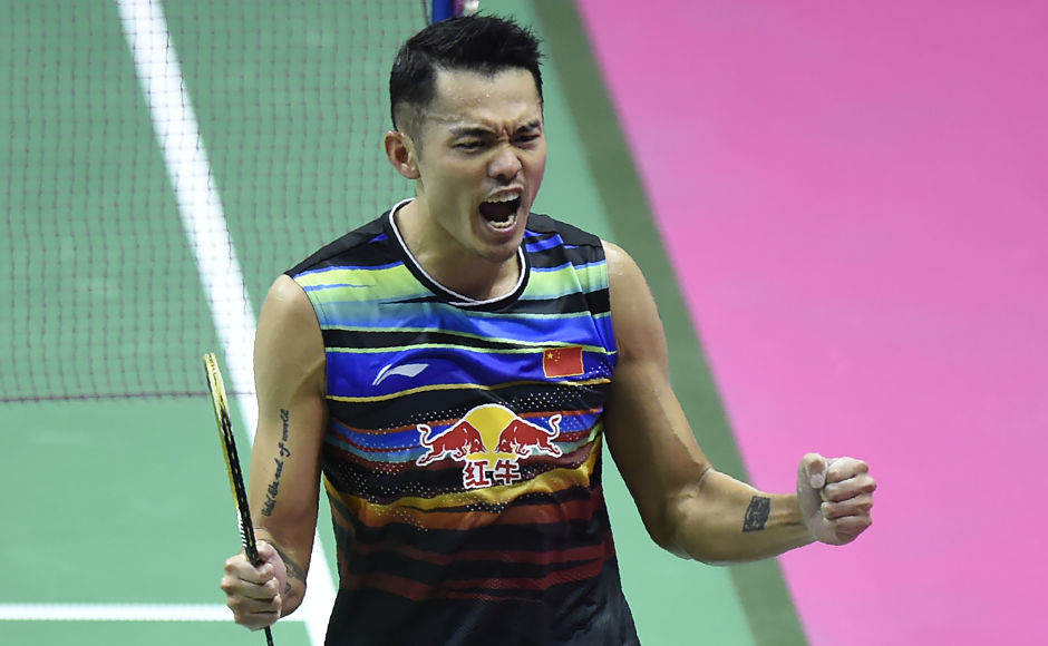 China's Lin Dan was also a happy man as he won against Denmark's Emil Holst in their round two mens's singles match. AFP