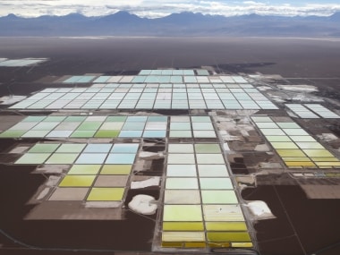 An aerial view shows the brine pools and processing areas of the Soquimich (SQM) lithium mine on the Atacama salt flat. Image Credit: Reuters