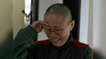 Liu Xiaobo's widow Liu Xia appears in online video, asks people to give her 'time to mourn'
