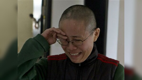 Liu Xiaobo's widow Liu Xia appears in online video, asks people to give her 'time to mourn'