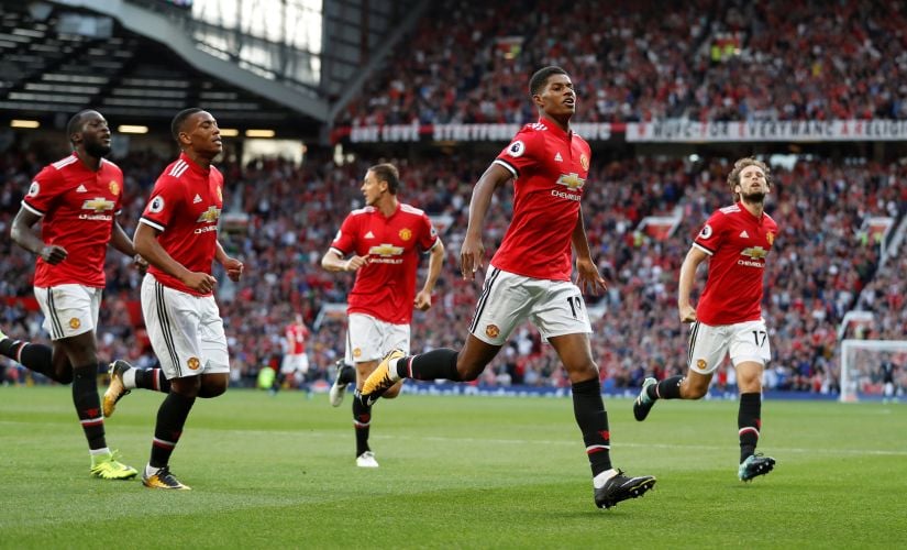 Football Soccer - Premier League - Manchester United vs Leicester City - Manchester, Britain - August 26, 2017 Manchester United's Marcus Rashford celebrates scoring their first goal with teammates Action Images via Reuters/Carl Recine EDITORIAL USE ONLY. No use with unauthorized audio, video, data, fixture lists, club/league logos or "live" services. Online in-match use limited to 45 images, no video emulation. No use in betting, games or single club/league/player publications. Please contact your account representative for further details. - RTX3DG3A
