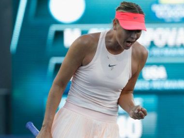 Maria Sharapova celebrates after winning a point. Image courtesy: Twitter/WTA