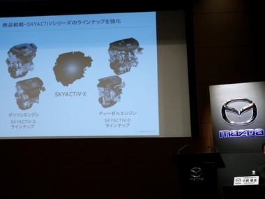 Mazda claims to become the first automaker to commercialise more efficient petrol engine Mazda claims to become the first automaker to commercialise more efficient petrol engine