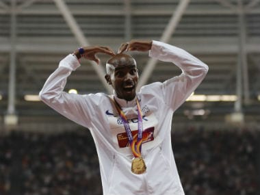 Britain's Mo Farah poses after winning the 10,000m race in London. AFP