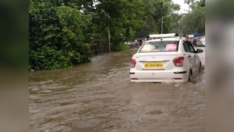 Rains lash Mumbai, flights delayed and transport affected as city experiences water-logging
