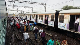 Mumbai rains: Crawling local trains, lack of buses make journey home difficult a day after heavy downpour